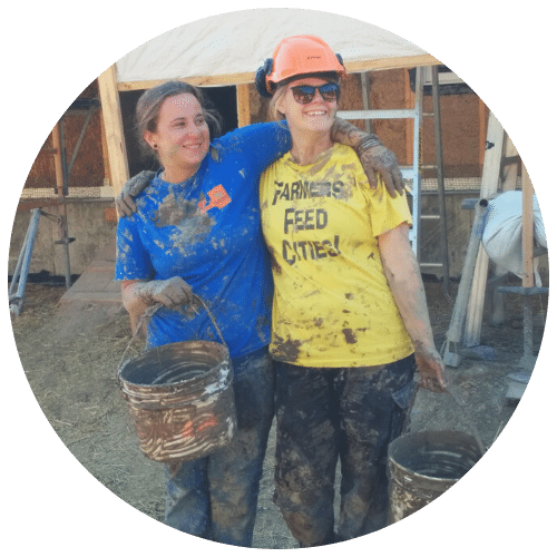 two women covered in plaster